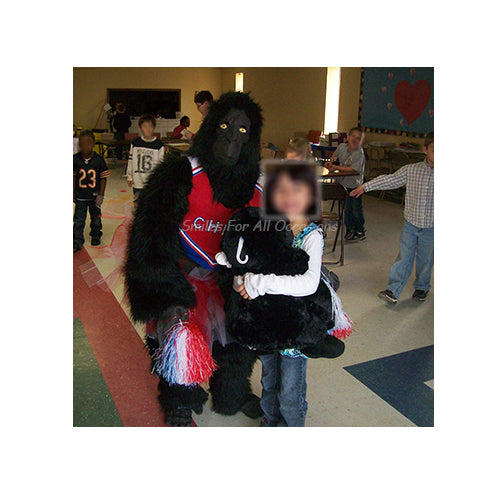 Black Gorilla in Cheer Leader Outfit with Little Girl Holding Stuffed Gorilla