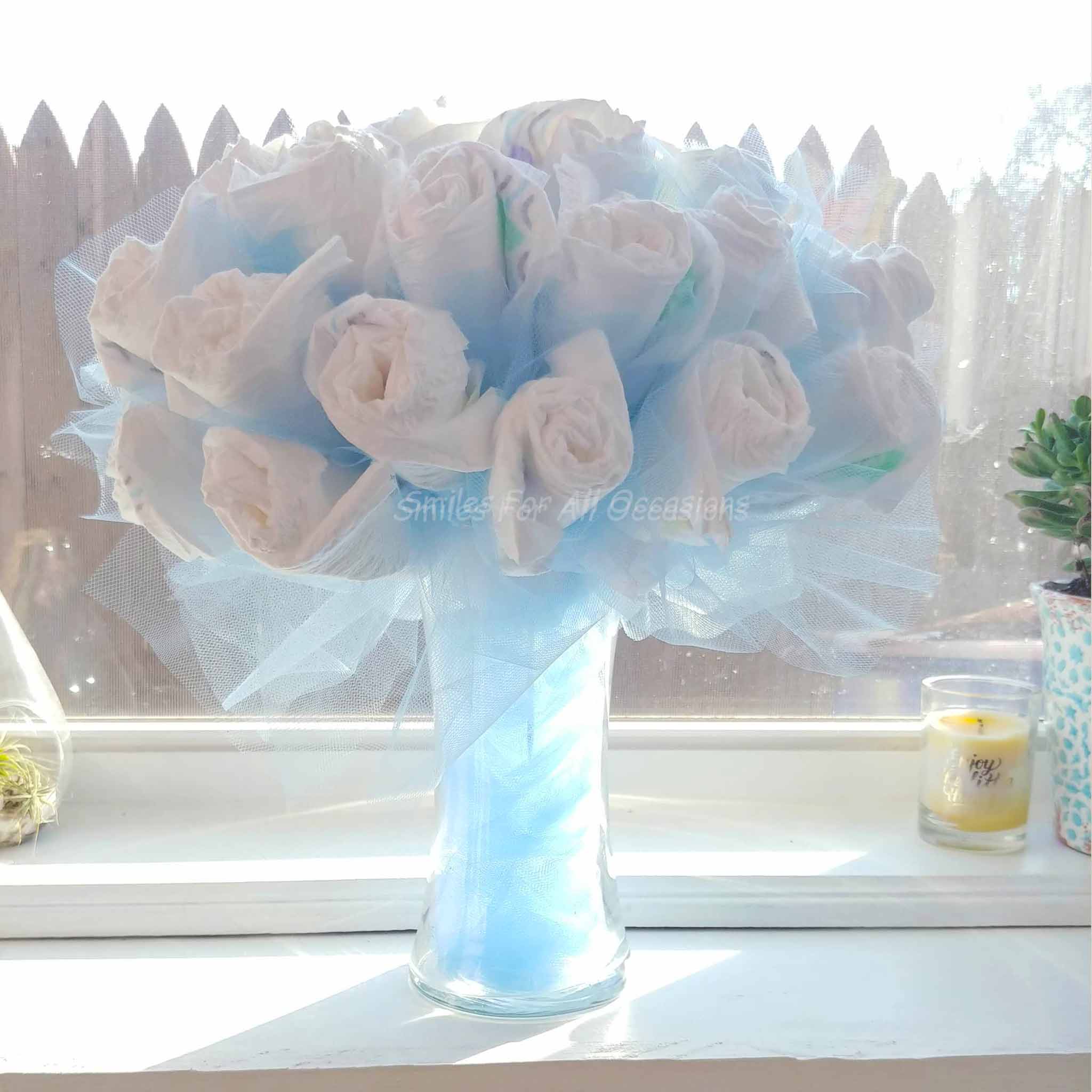 Blue Diaper Bouquet in front of a Window
