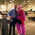 Sexy Pink Gorilla in Black Bra and Skirt with Red Boa and a Man